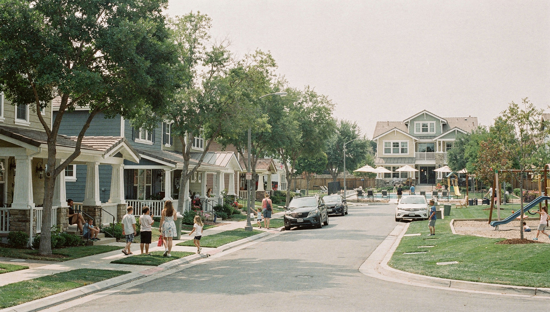 Ladera Ranch village with craftsman homes, tree-lined streets, and community clubhouse